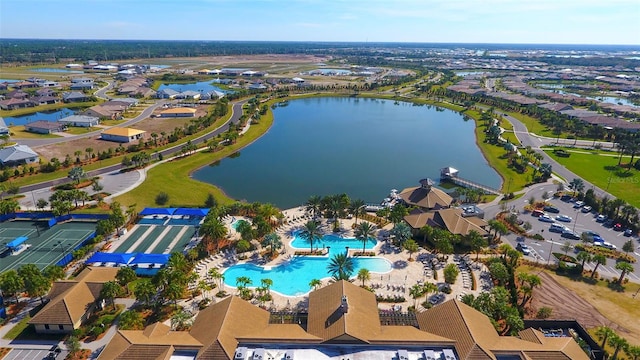 drone / aerial view with a water view