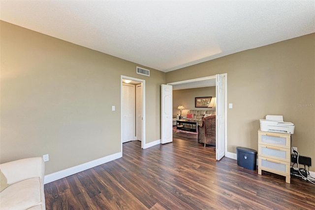 interior space with dark wood-type flooring