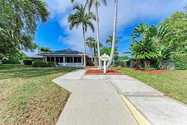 exterior space with a lawn