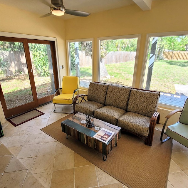 sunroom with plenty of natural light and ceiling fan