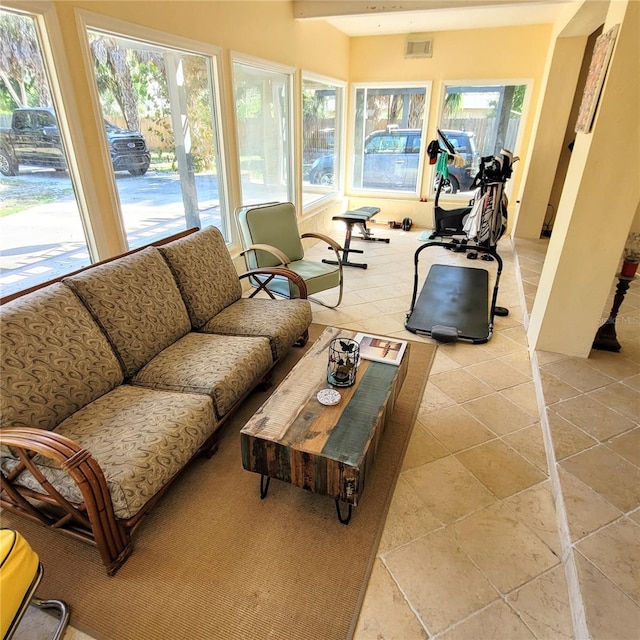 sunroom / solarium featuring plenty of natural light