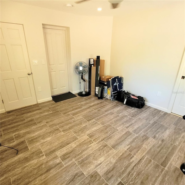 miscellaneous room with wood-type flooring