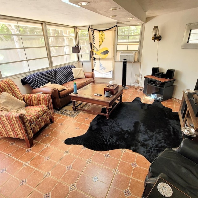 living room with plenty of natural light and light tile floors