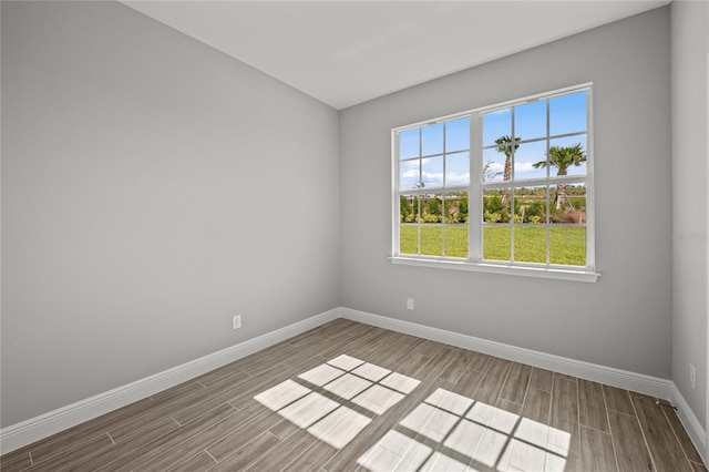 spare room with light wood-type flooring