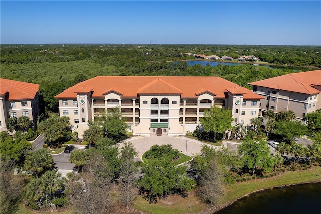 birds eye view of property featuring a water view