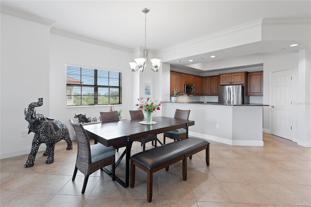 tiled dining room with crown molding and a chandelier