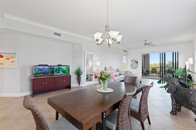 dining room featuring ornamental molding, ceiling fan with notable chandelier, and light tile patterned floors