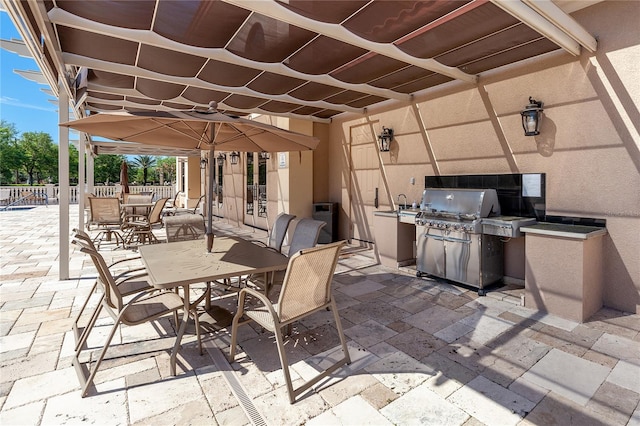 view of patio / terrace featuring a grill