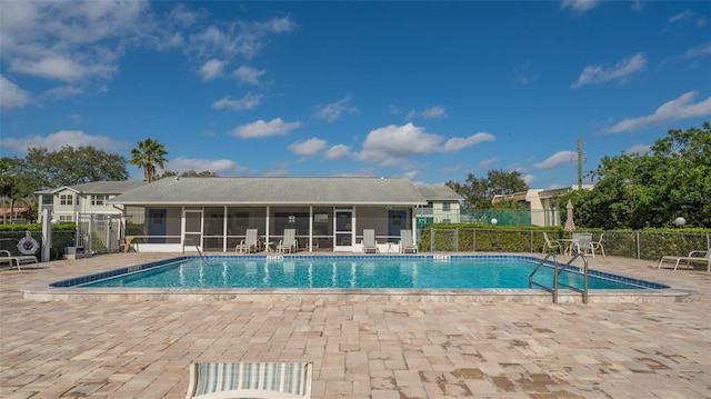 view of pool featuring a patio