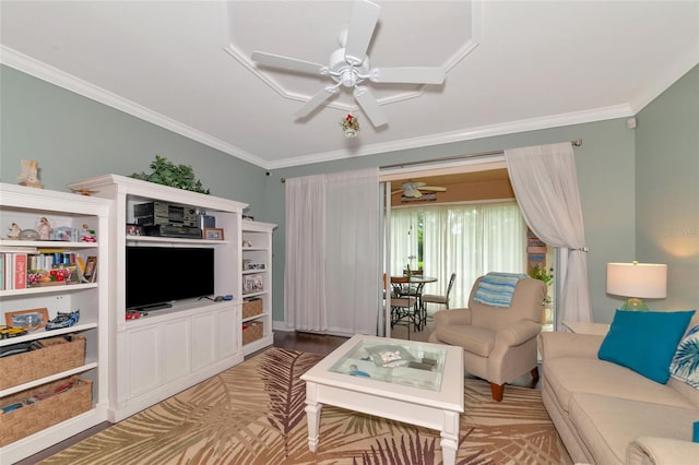 living room with crown molding, ceiling fan, and light hardwood / wood-style flooring