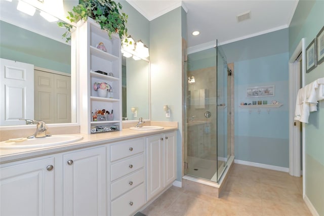 bathroom with double sink, crown molding, a shower with shower door, tile floors, and large vanity