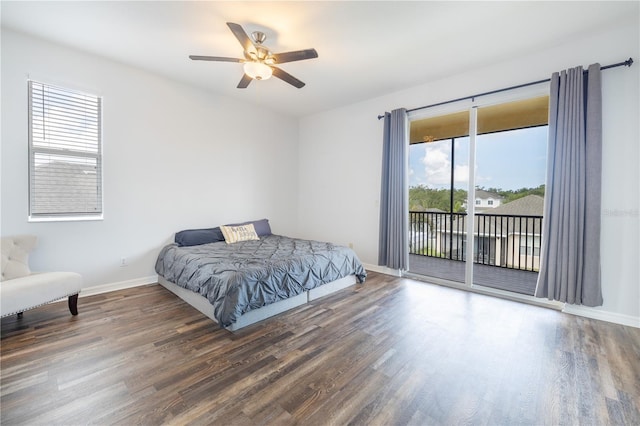 bedroom featuring access to outside, ceiling fan, and dark hardwood / wood-style flooring