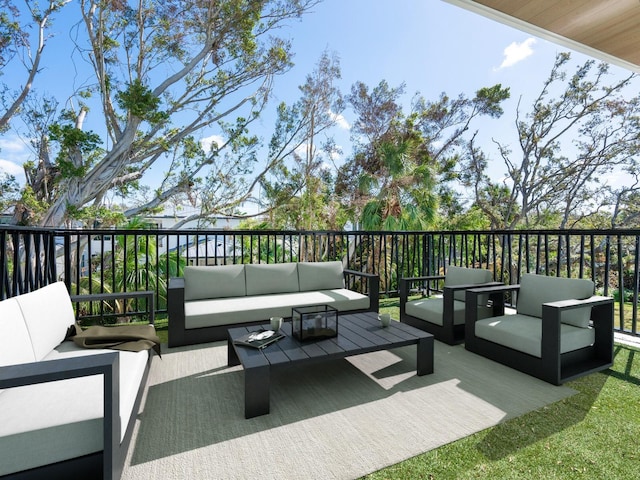 wooden deck featuring an outdoor hangout area