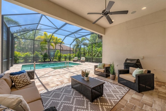 sunroom / solarium with ceiling fan, a pool, and vaulted ceiling