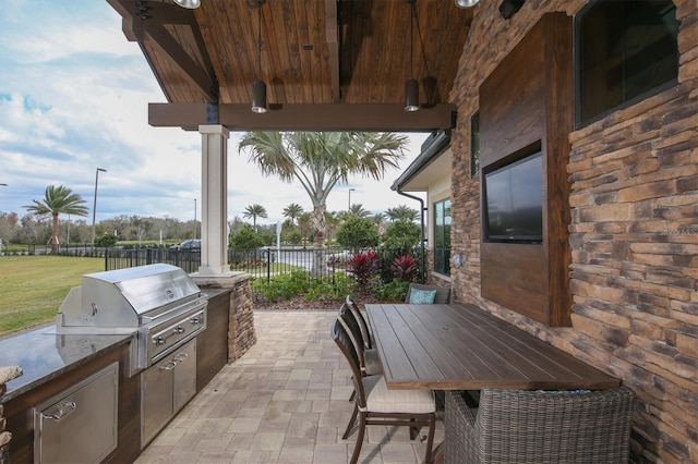 view of patio featuring area for grilling and grilling area