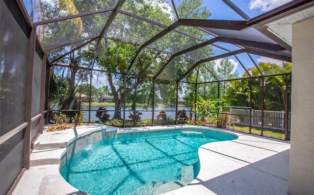 view of swimming pool with a fenced in pool, a lanai, a water view, and a patio