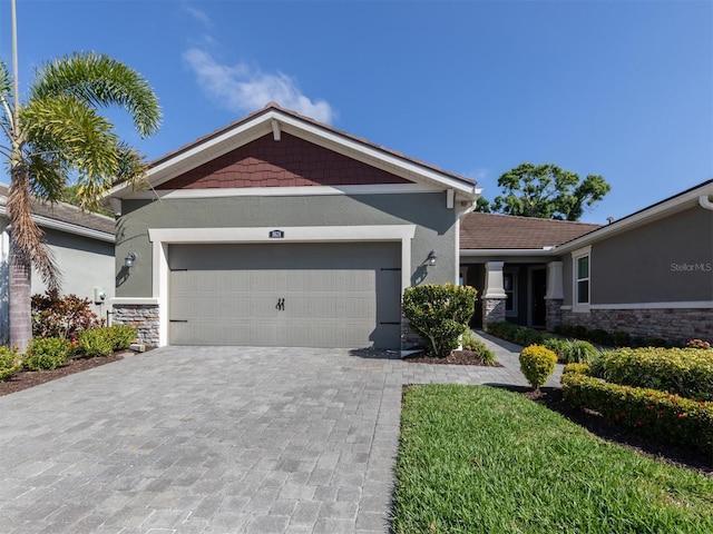 view of front of home with a garage