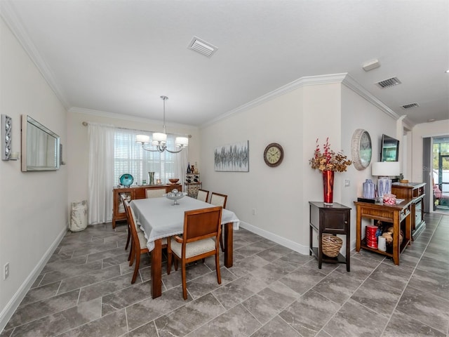 dining space featuring an inviting chandelier, ornamental molding, and a healthy amount of sunlight