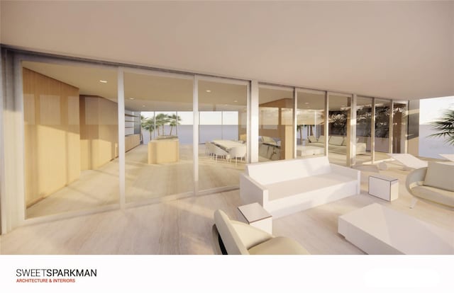 unfurnished living room featuring light hardwood / wood-style floors and a wall of windows