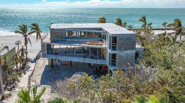 rear view of property featuring a water view