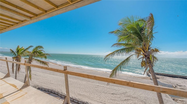 property view of water featuring a beach view