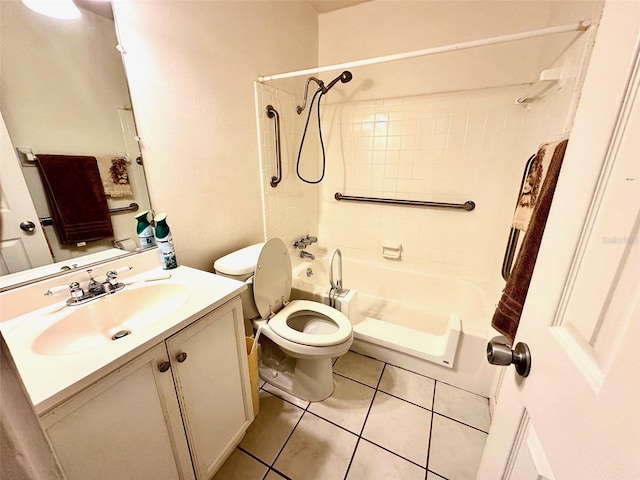 bathroom with toilet, tile flooring, and oversized vanity