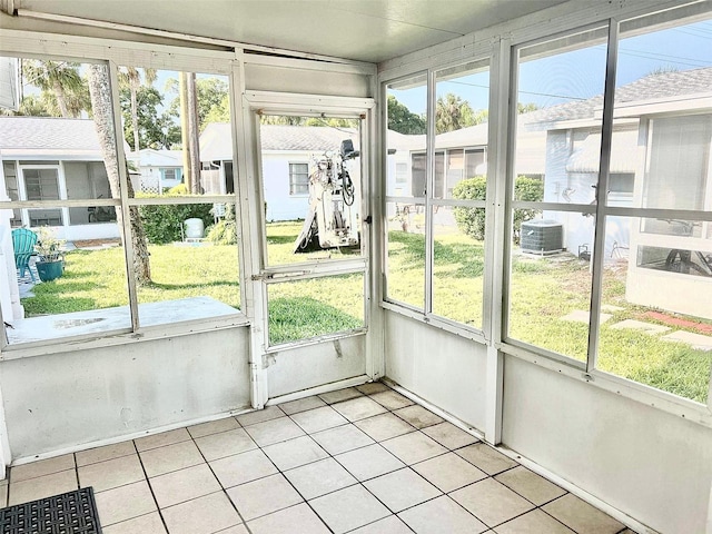 unfurnished sunroom with a wealth of natural light