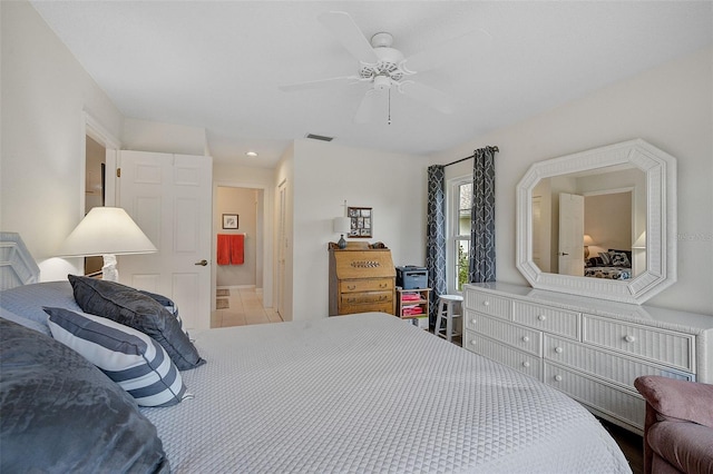 bedroom with ceiling fan and ensuite bathroom