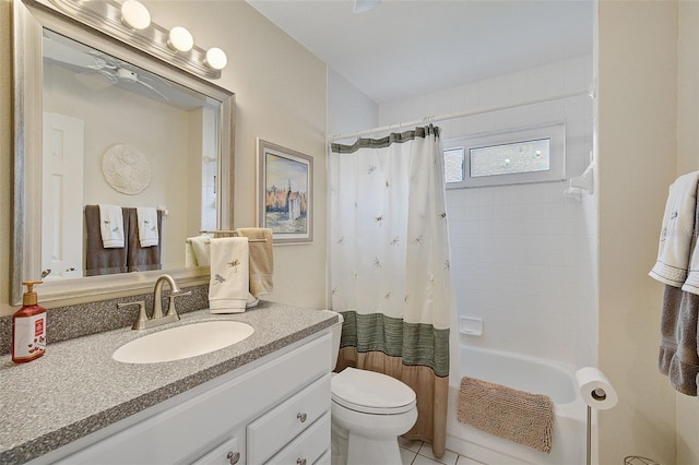 full bathroom with shower / tub combo, tile flooring, toilet, and large vanity