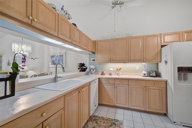 kitchen featuring ceiling fan with notable chandelier, white appliances, sink, light tile flooring, and light brown cabinets