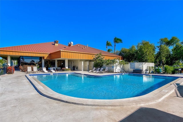 view of pool featuring a patio area