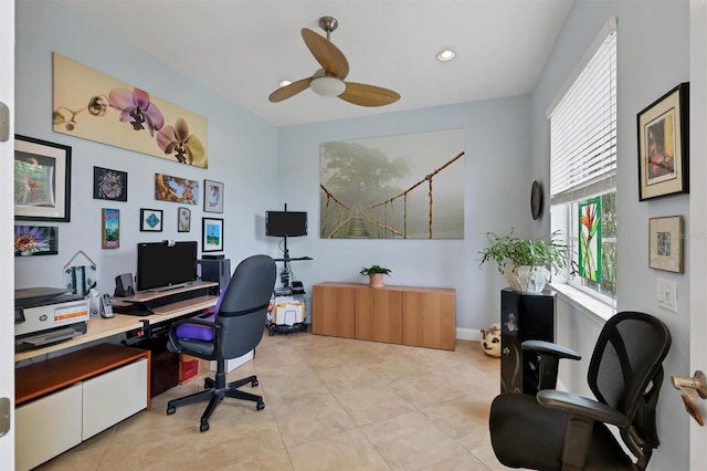 office space featuring ceiling fan and light tile flooring