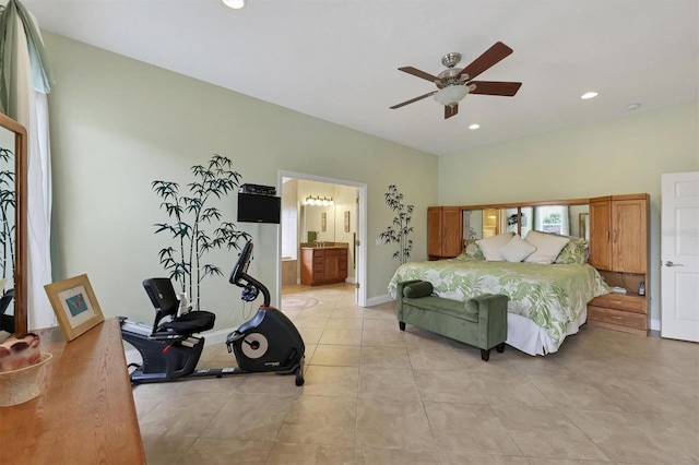 bedroom with ceiling fan, ensuite bathroom, and light tile floors