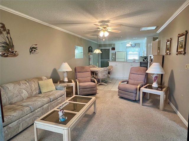 carpeted living room featuring crown molding, ceiling fan, and a textured ceiling