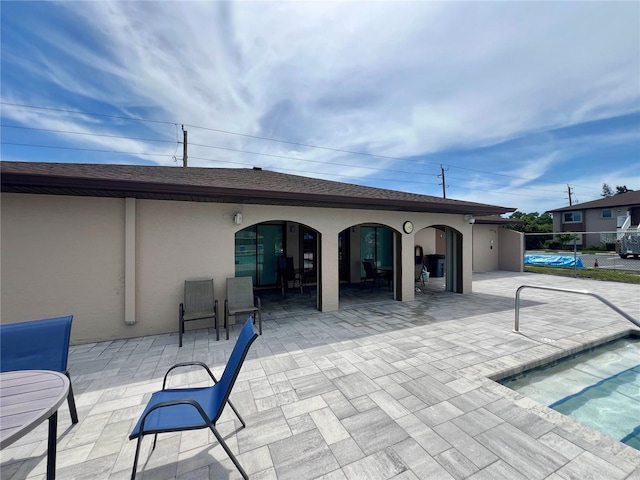 exterior space with a pool