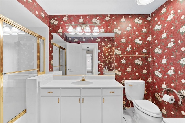 bathroom featuring tile flooring, oversized vanity, and toilet