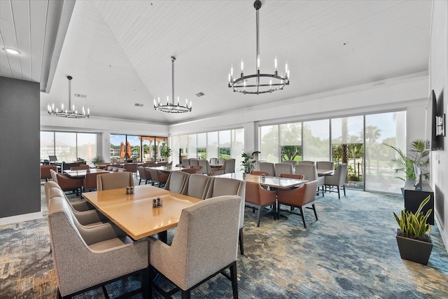 dining room featuring a wealth of natural light and a chandelier