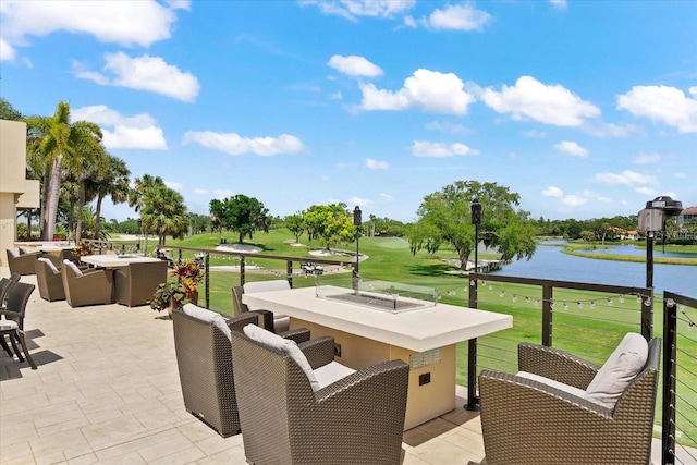 view of terrace featuring a water view