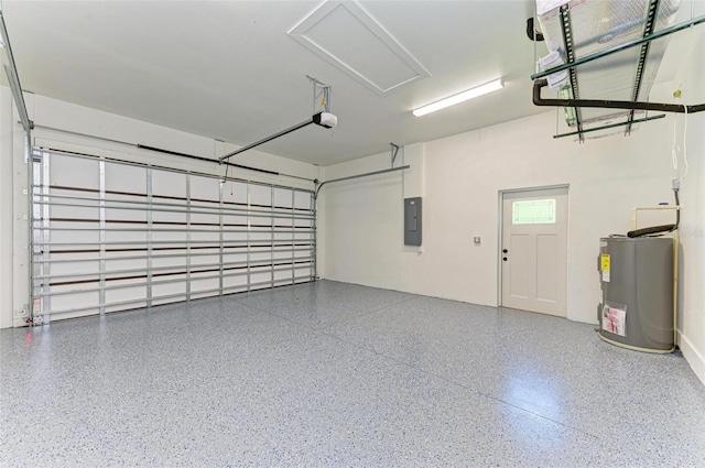 garage with electric water heater and a garage door opener