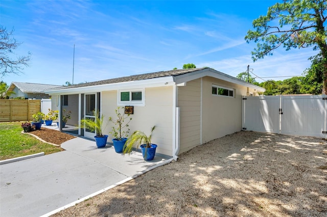 back of house featuring a patio