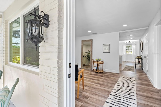 interior space with hardwood / wood-style flooring