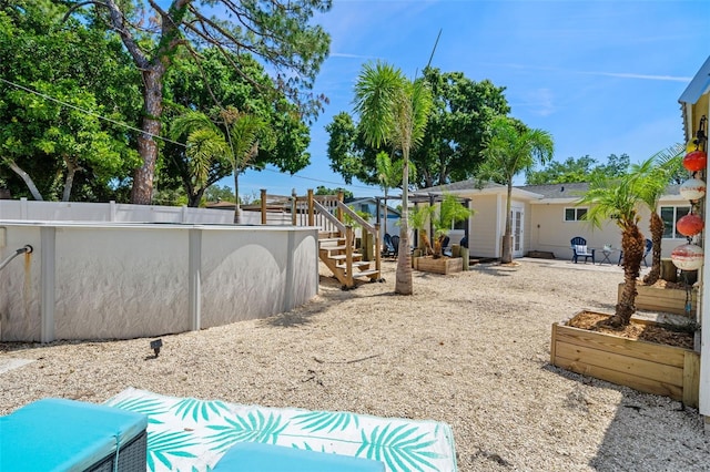 view of yard featuring a patio area