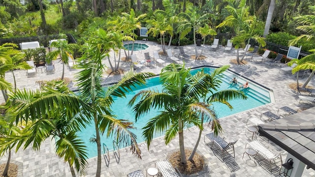 view of swimming pool featuring a patio area