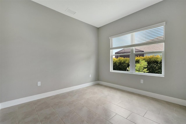 view of tiled spare room