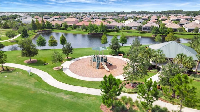 birds eye view of property featuring a water view