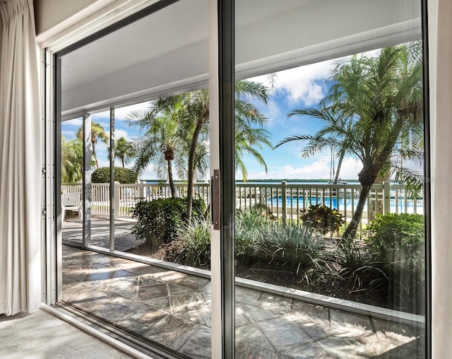 doorway featuring a water view