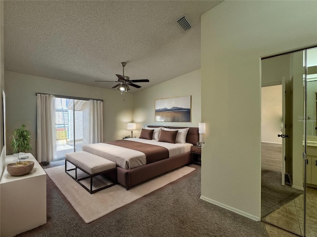 bedroom with carpet flooring, lofted ceiling, access to exterior, ceiling fan, and a textured ceiling