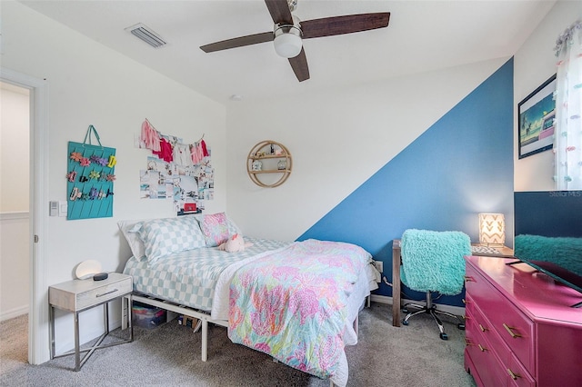 carpeted bedroom featuring ceiling fan