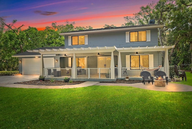 exterior space with a pergola, a yard, and a porch