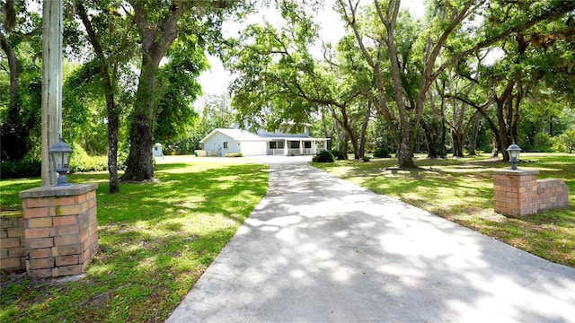 view of front of home featuring a front lawn